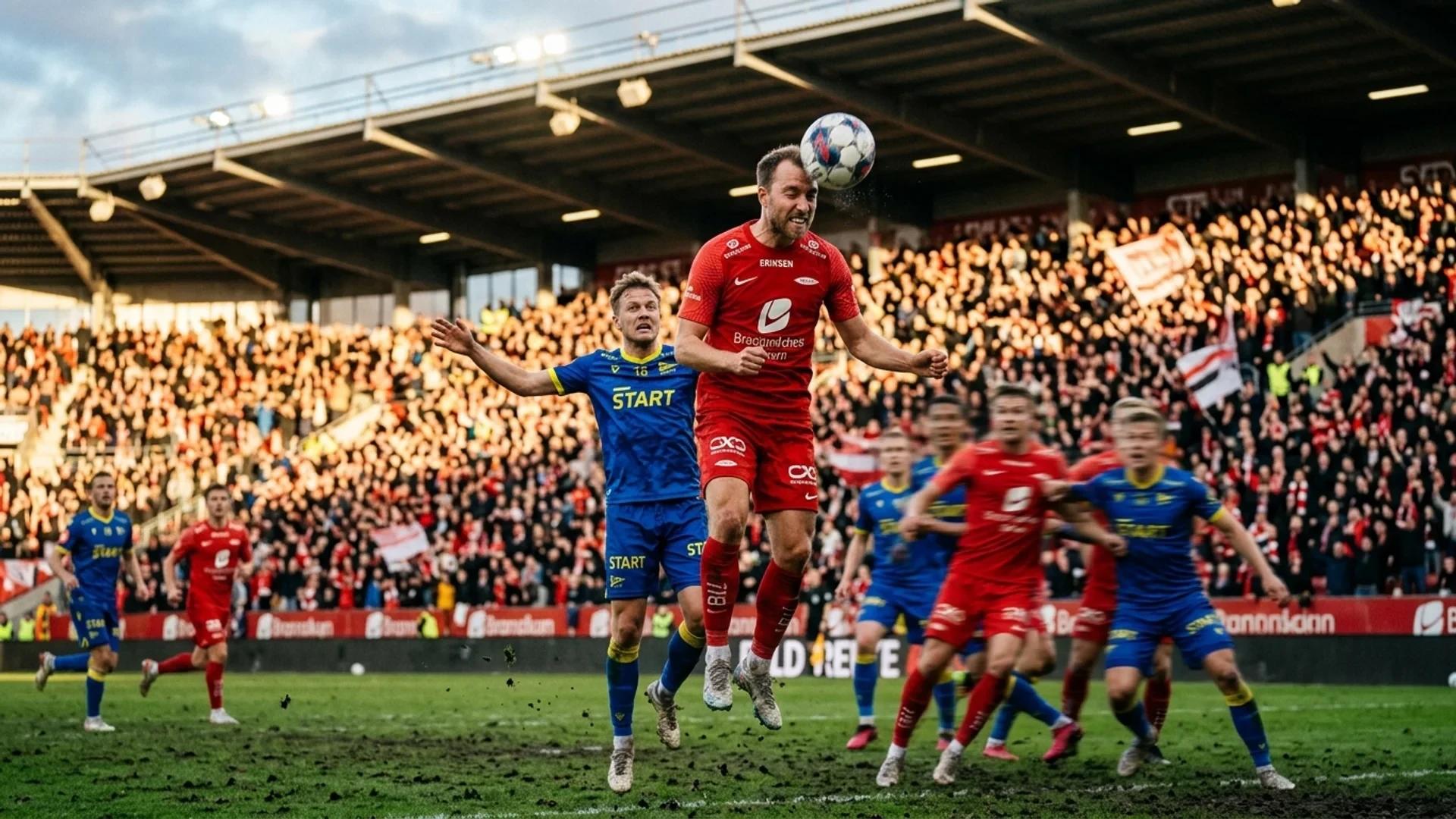 Kristian Eriksen, mid-action, heads the ball during a soccer match.
