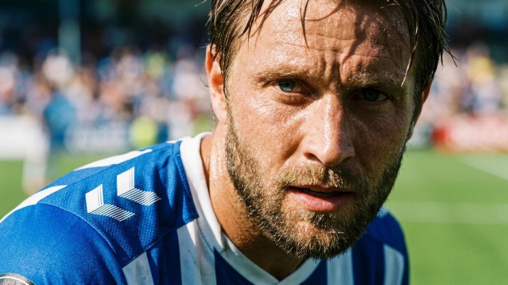 Close-up of a soccer player Marius Lode in intense sunlight, showcasing his focused expression.