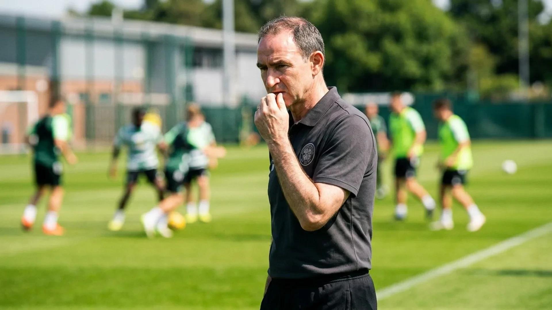 Celtic manager Martin O'Neill looks focused during a training session under the midday sun.