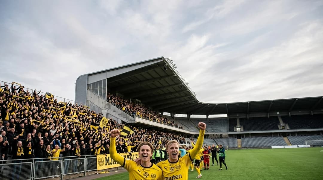 Aki Samuelsen and Jacob Bergström celebrate a victory at Strandvallen stadium during a Champions League qualification match.
