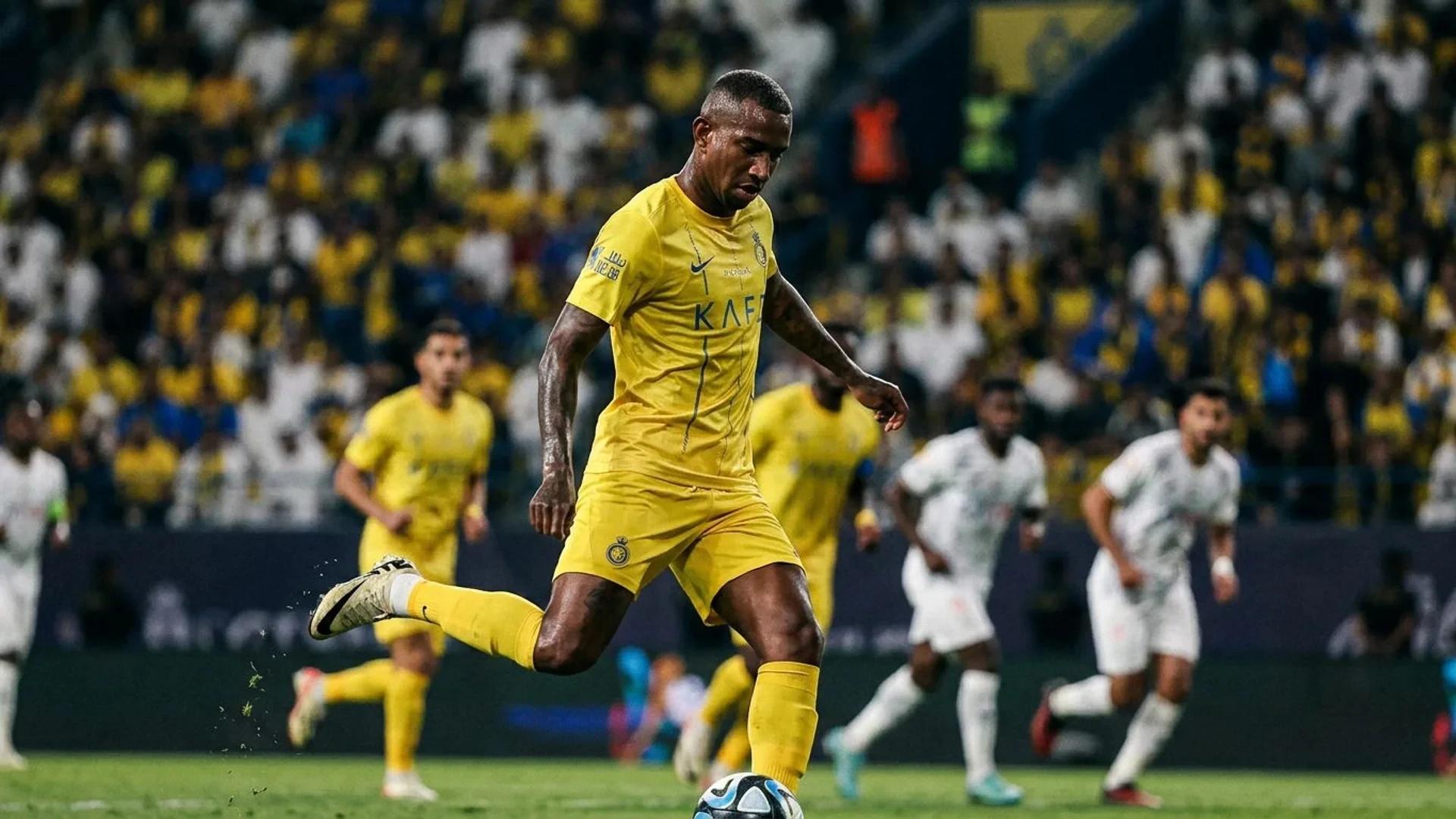 Close-up photograph of a football player executing a free kick.