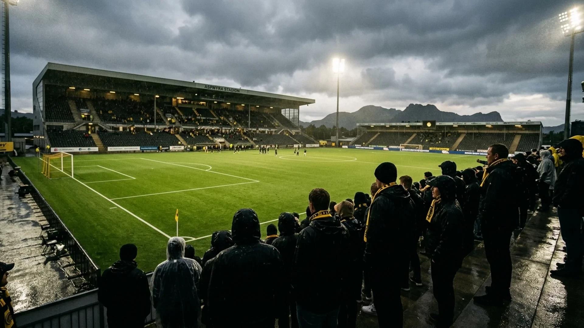 Bodø/Glimt supporters in front of Aspmyra Stadium, under an overcast sky.