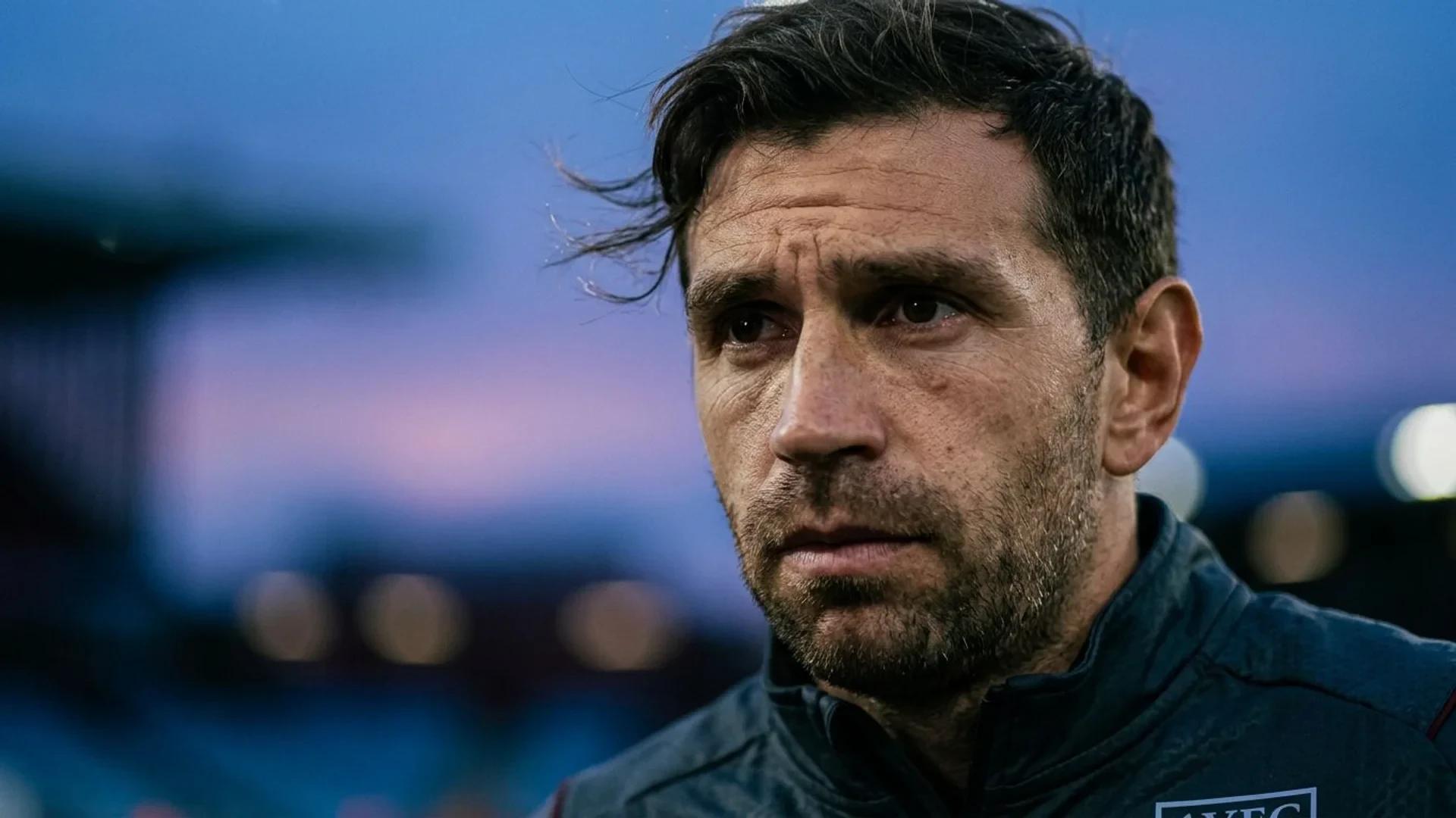 Close-up of Emi Martinez's face showing intense emotions during dusk.