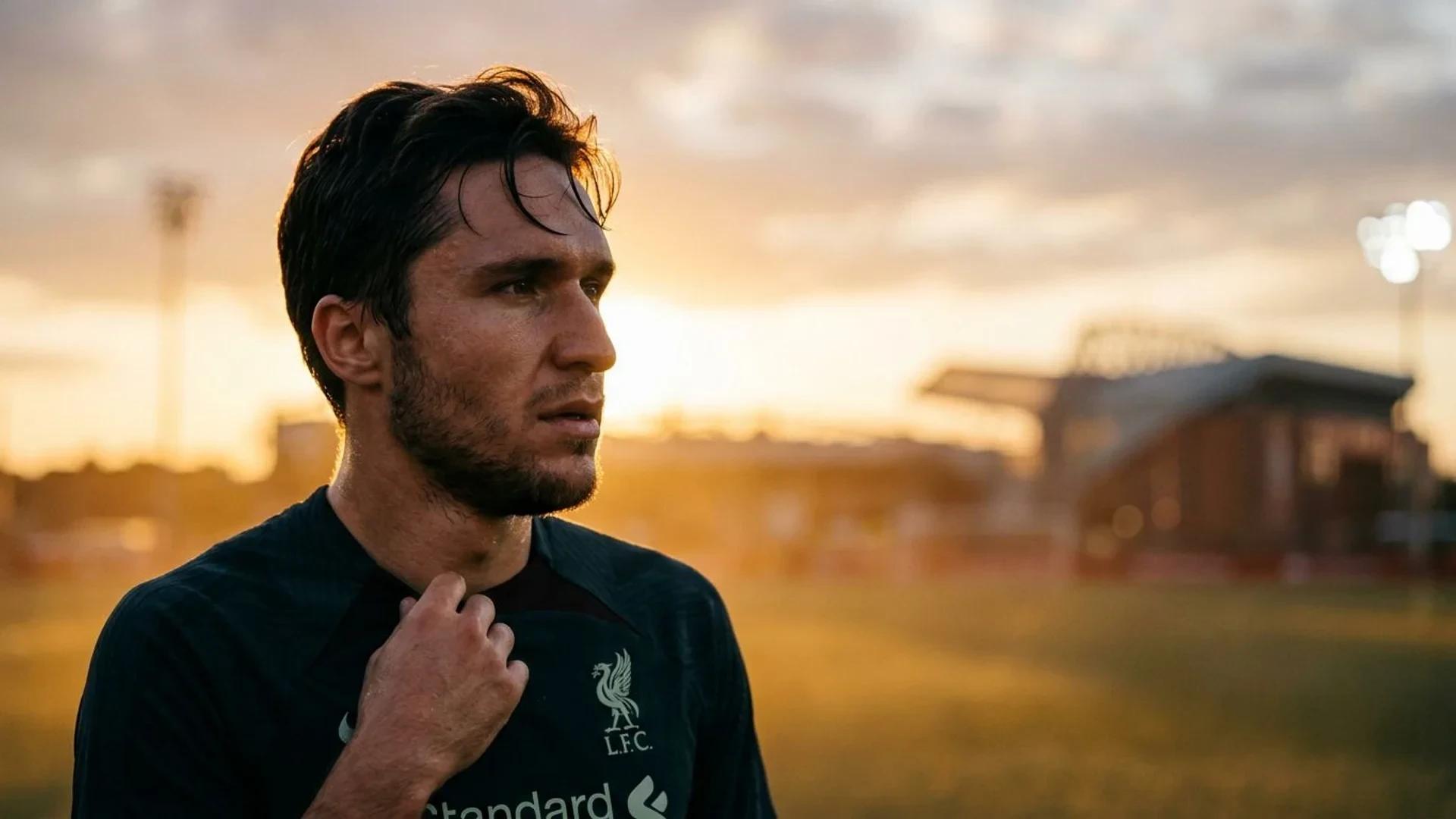 Close-up portrait of Federico Chiesa in golden hour light, looking determined.
