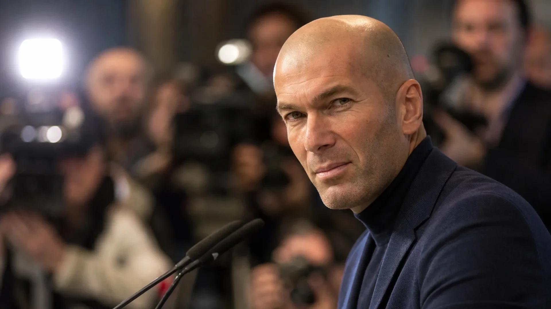 Zinédine Zidane stands at a press conference, looking determined as he discusses his new role.