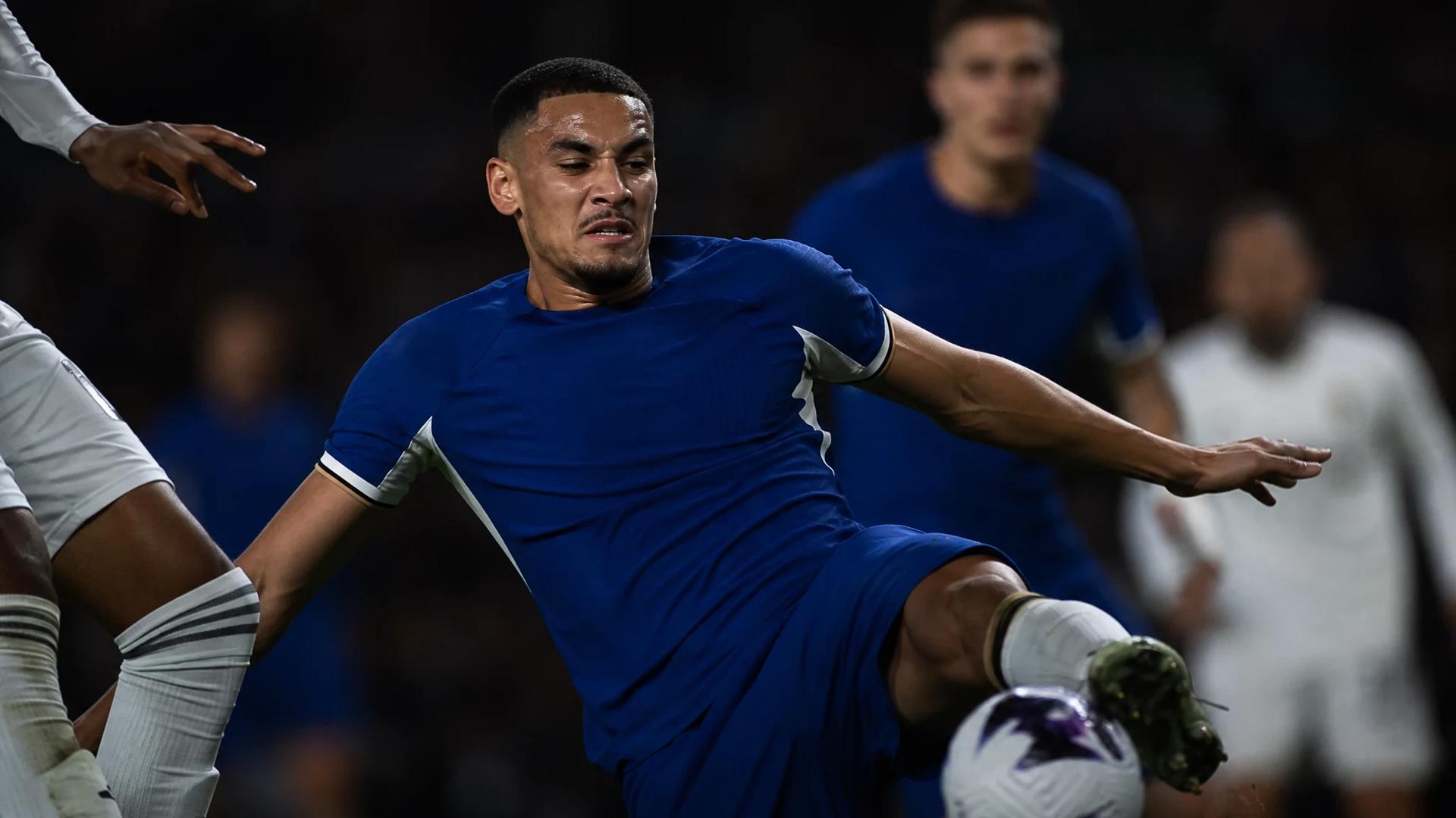 Maxence Lacroix in action during a football match, demonstrating intense focus and athleticism.