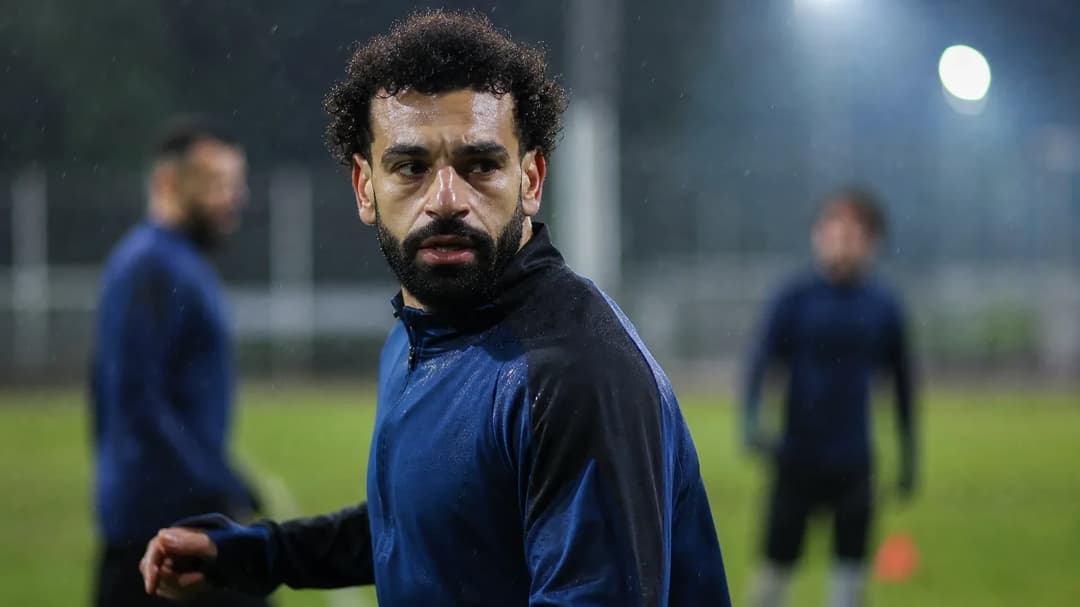 Mohamed Salah engaged in a training session, showing intense focus and determination.