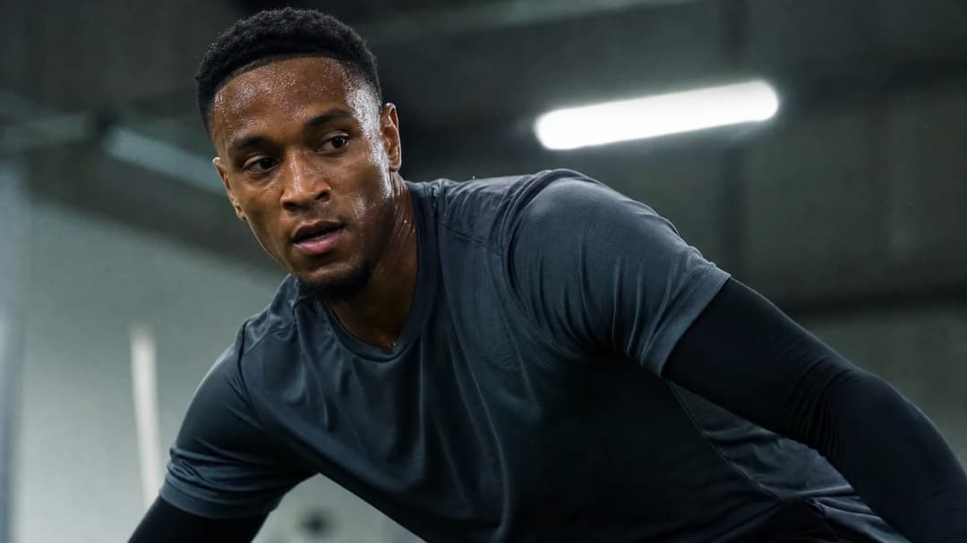 Ezri Konsa during a training session, showcasing focus and determination.