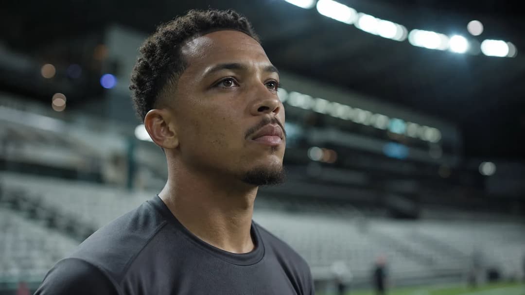 Tjaronn Chery in a reflective moment before a football match.