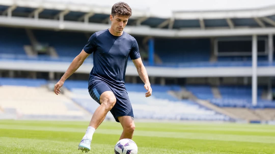 Christian Nørgaard training at Goodison Park, focused on the football.