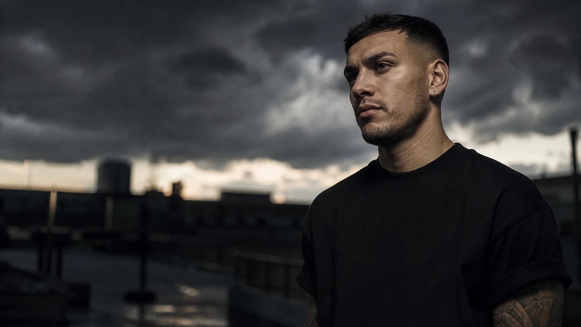 Leandro Paredes in a moment of reflection under a stormy sky.