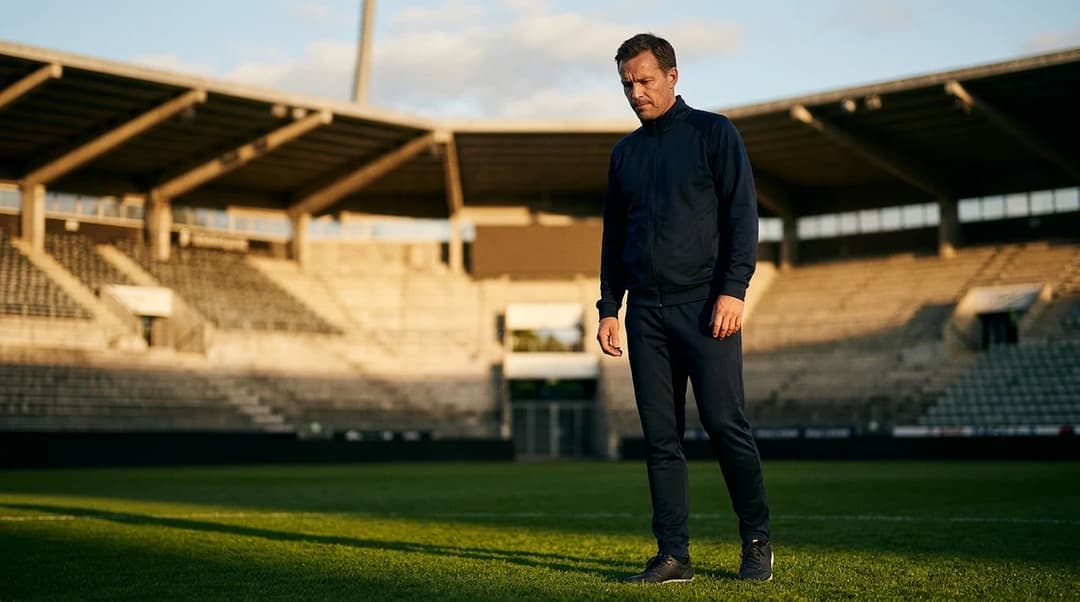 Johannes Moesgaard standing on the football pitch at Åråsen, lost in thought.