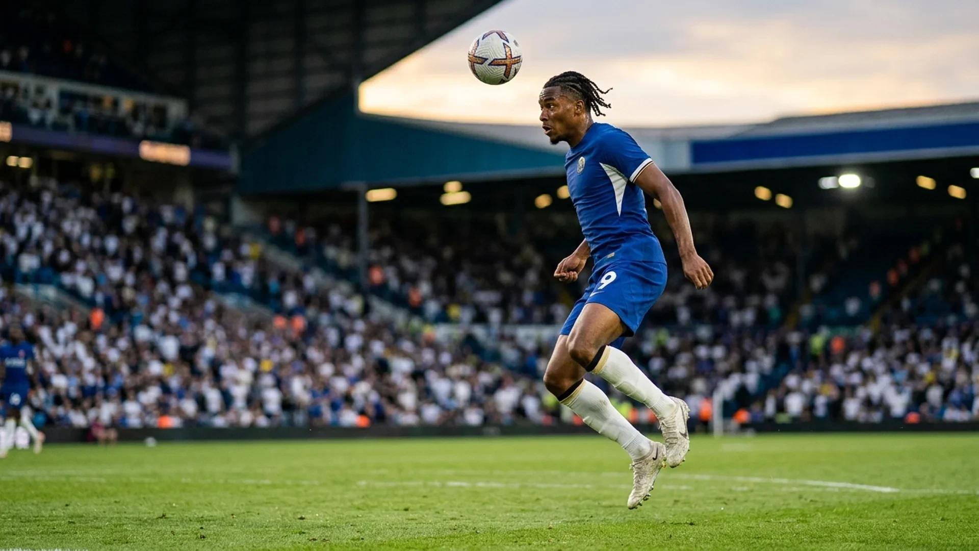 Dominic Calvert-Lewin leaping to head the ball at Elland Road during a match.