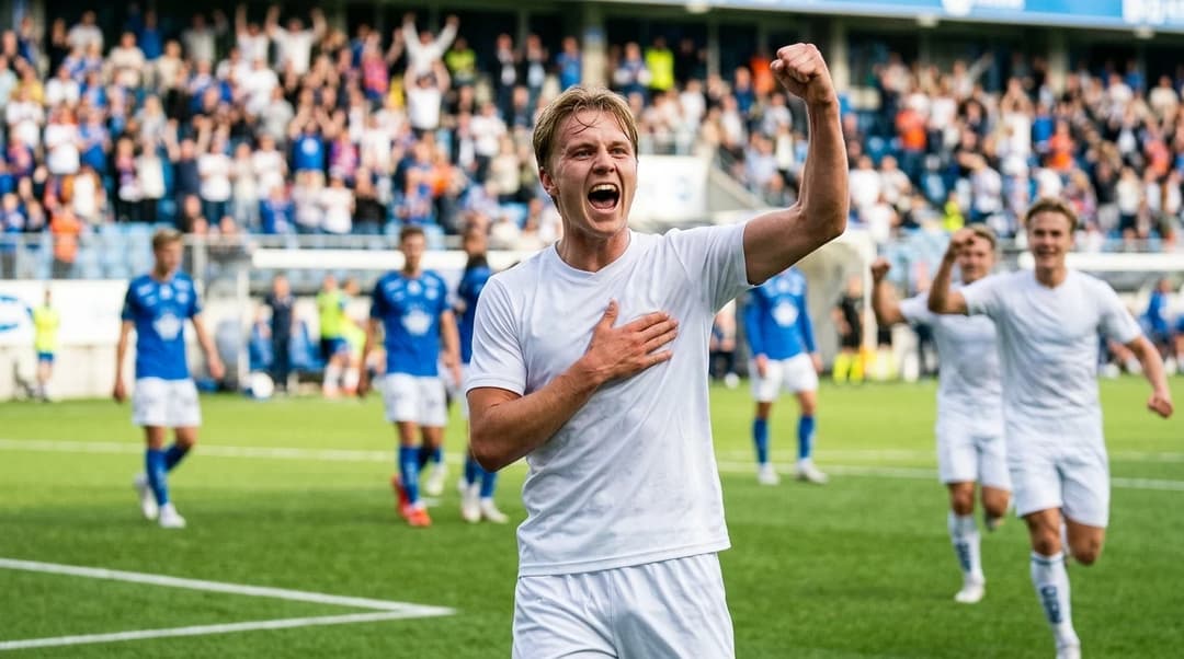 Isak Skotheim celebrating a goal on the football pitch.