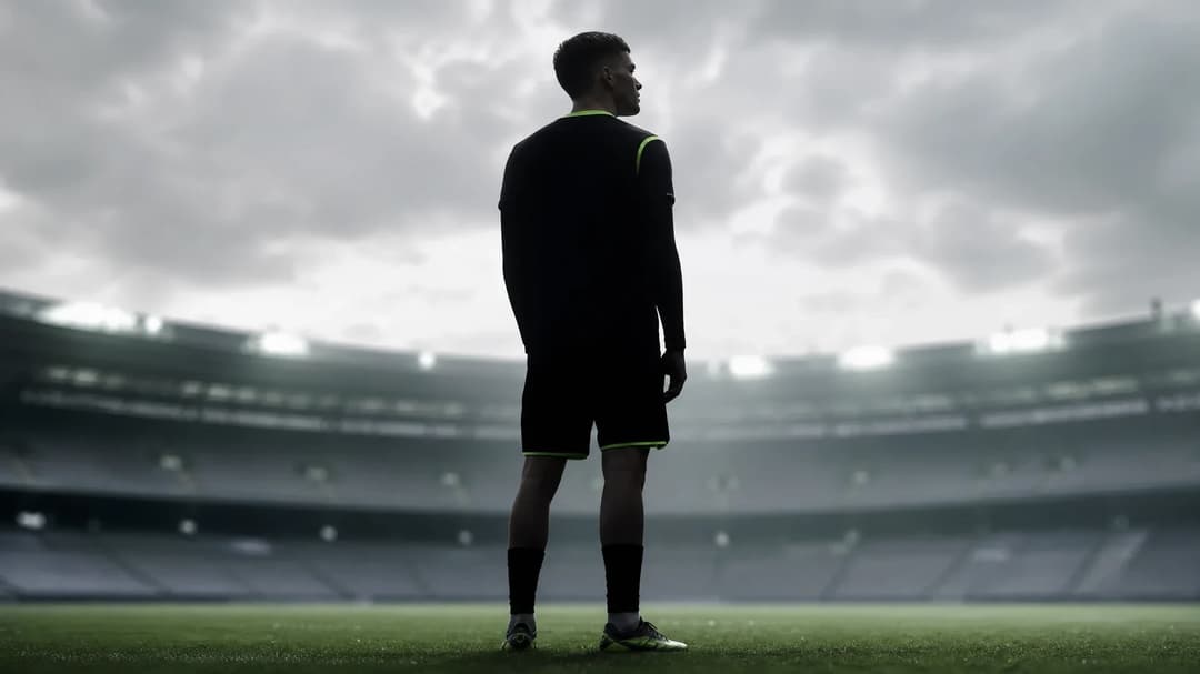 Florian Wirtz stands in silhouette against a bright football pitch, reflecting on recent pressures.