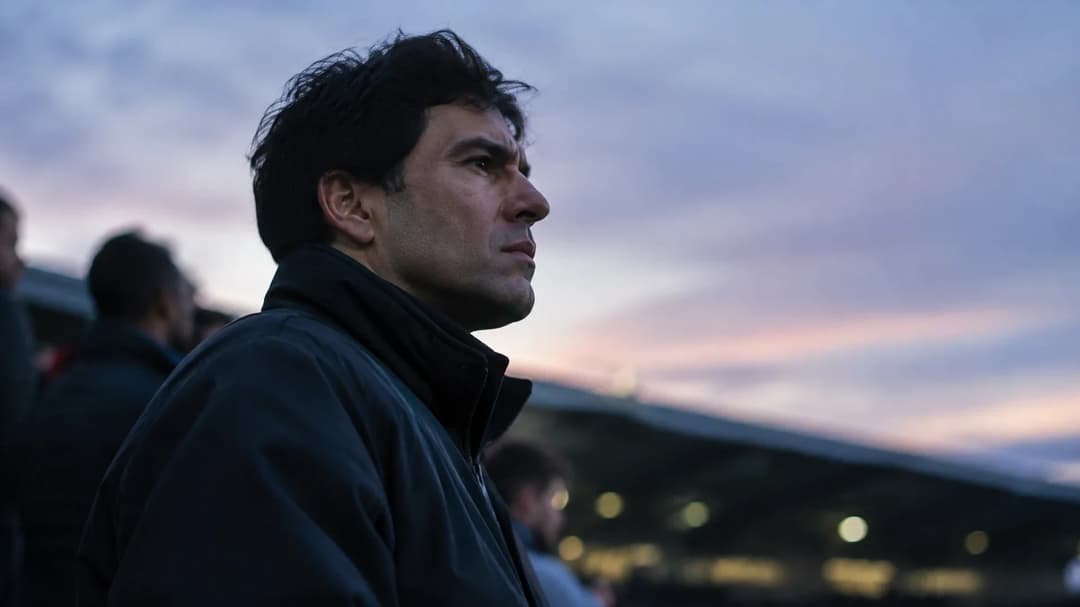 Rui Pinto stands silhouetted at dusk, conveying a sense of determination amidst uncertainty.
