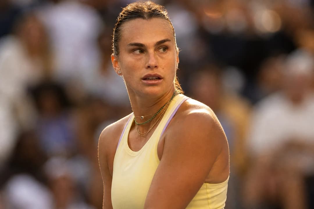 Aryna Sabalenka preparing to serve at the Cincinnati Open.