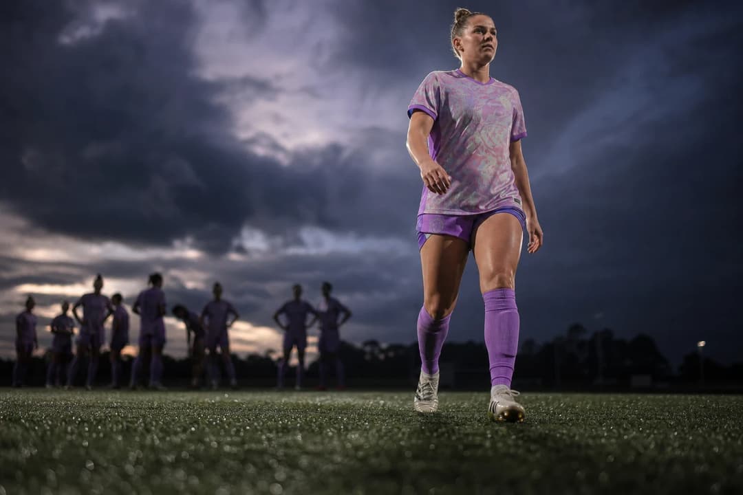 Close-up of Morgan Weaver's feet on the pitch, symbolizing her return to football.