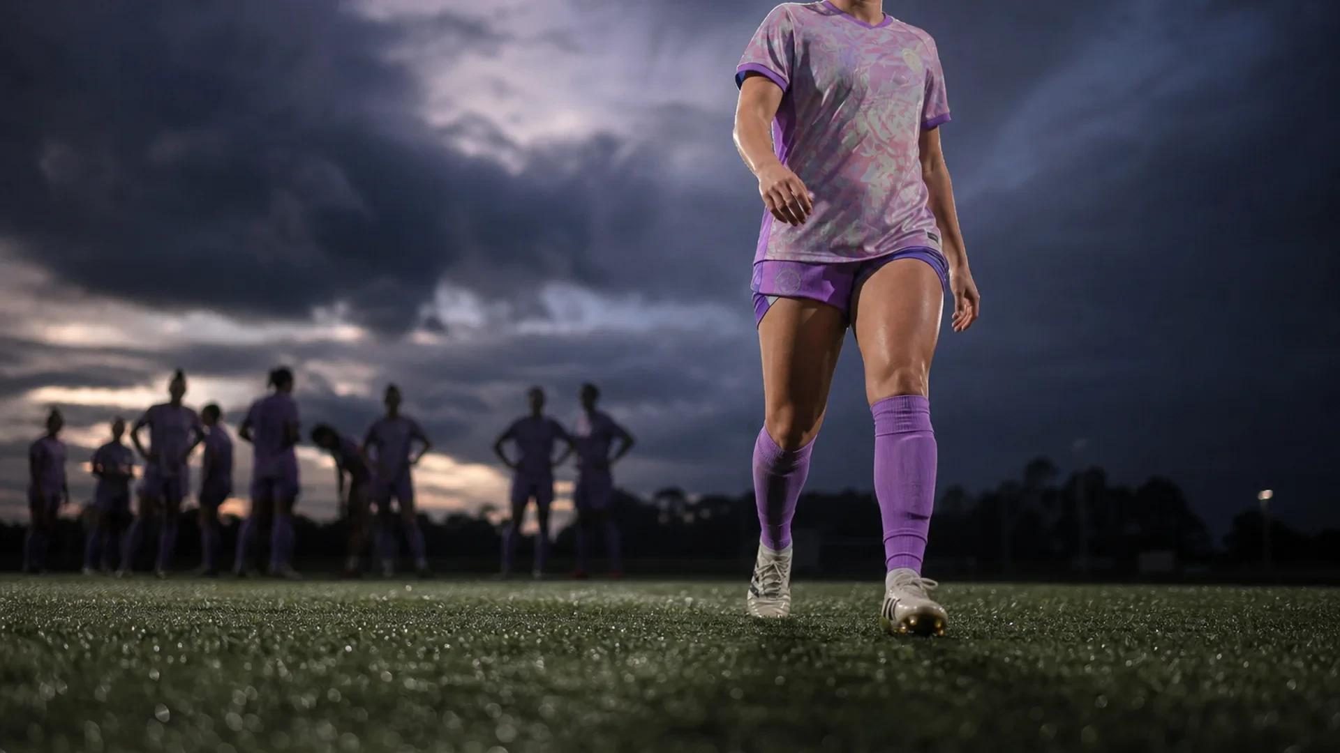 Close-up of Morgan Weaver's feet on the pitch, symbolizing her return to football.