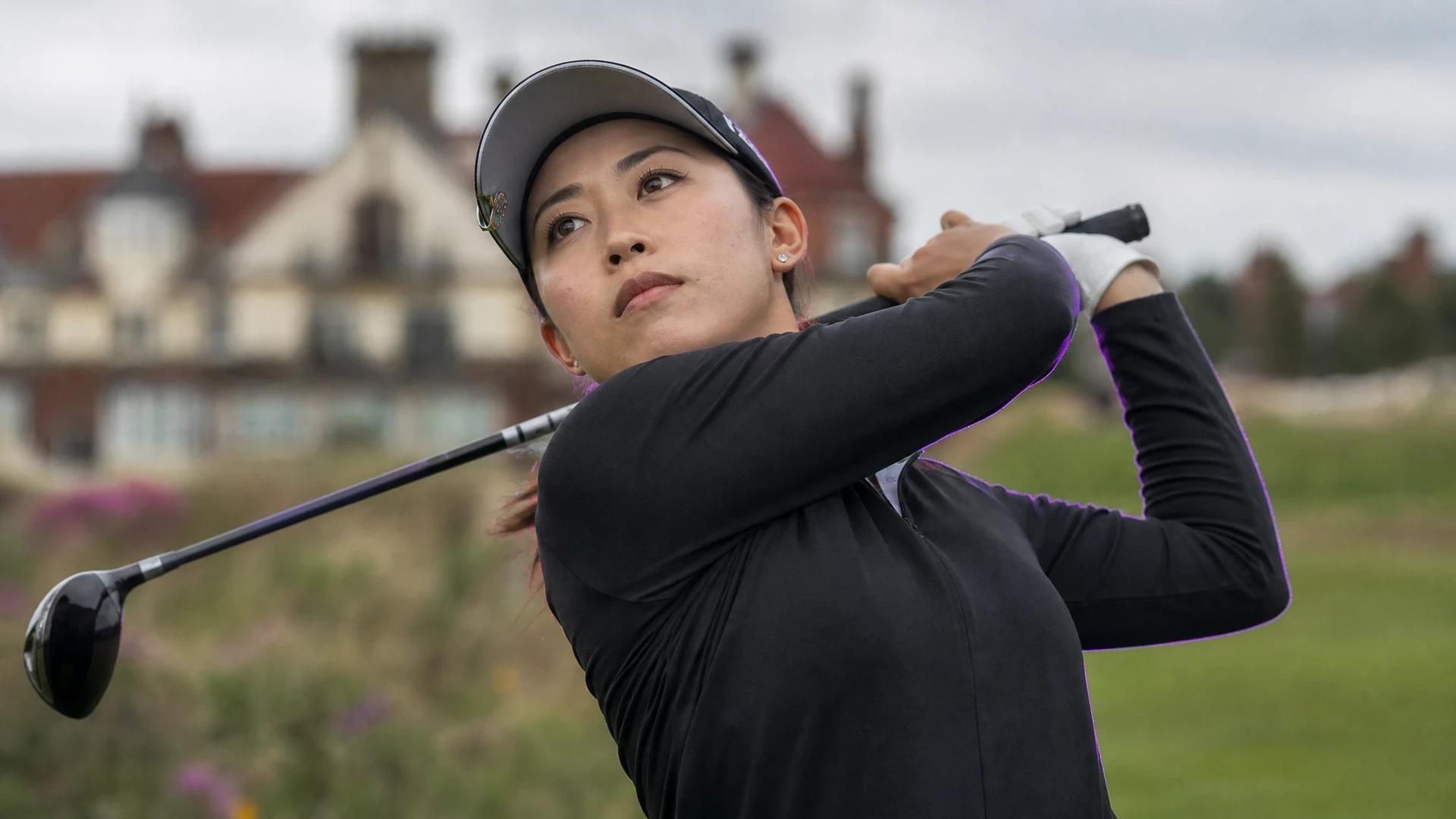 A female golfer in action at Royal Lytham & St Annes, captured in a close-up shot.