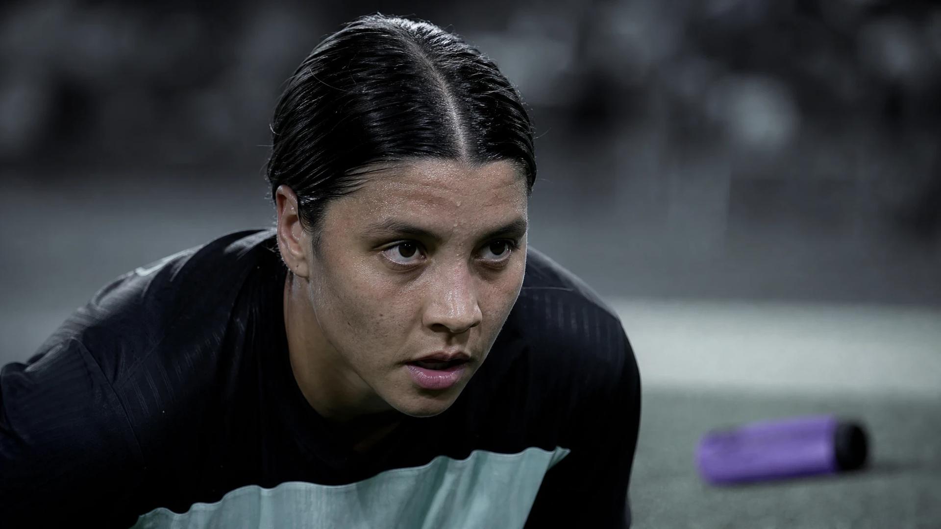 Close-up of footballer Sam Kerr preparing for a free kick.