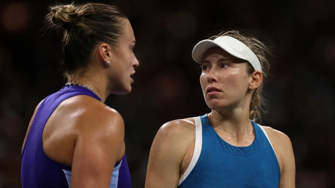 Close-up of Aryna Sabalenka and Ekaterina Alexandrova on the tennis court, capturing their emotions during a match.