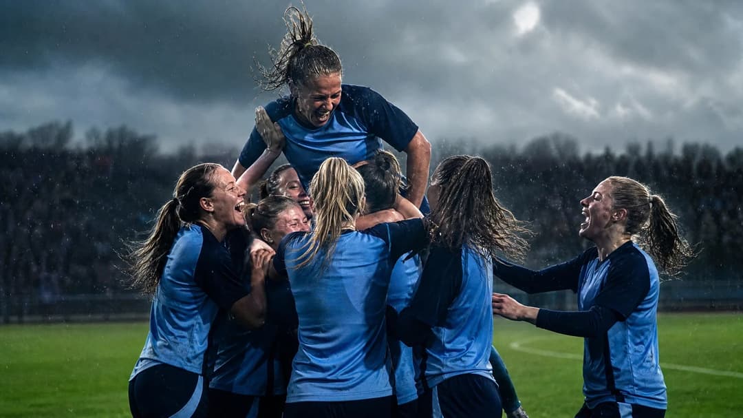 Djurgården women's football team celebrating a victory on the pitch.