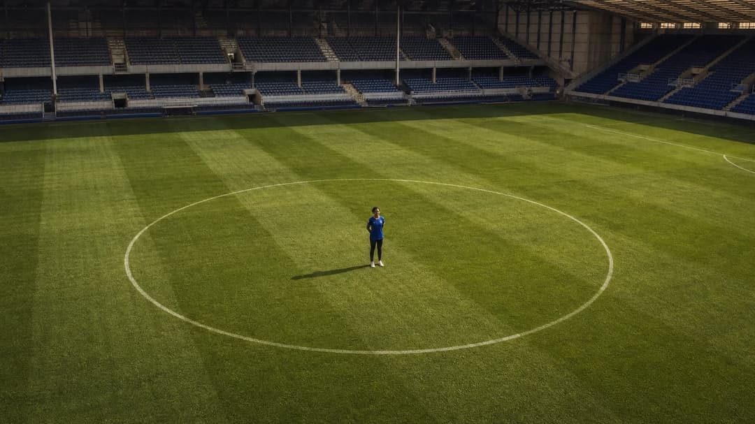 A bird's-eye view of Goodison Park with Hannah Silcock on the pitch.