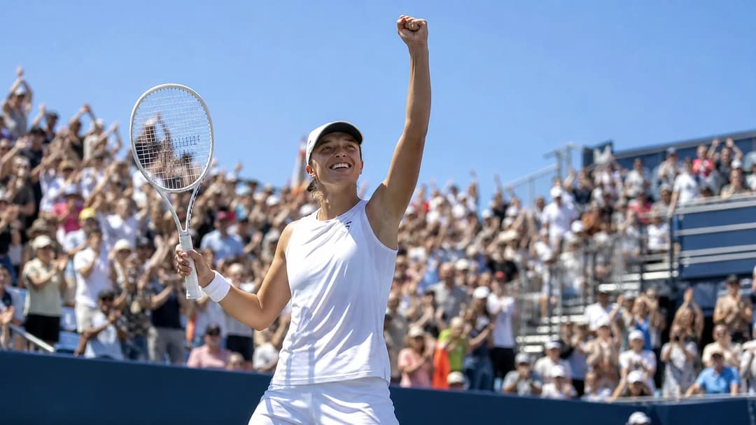 Tennis player Iga Świątek celebrating her victory at the Canadian Open.