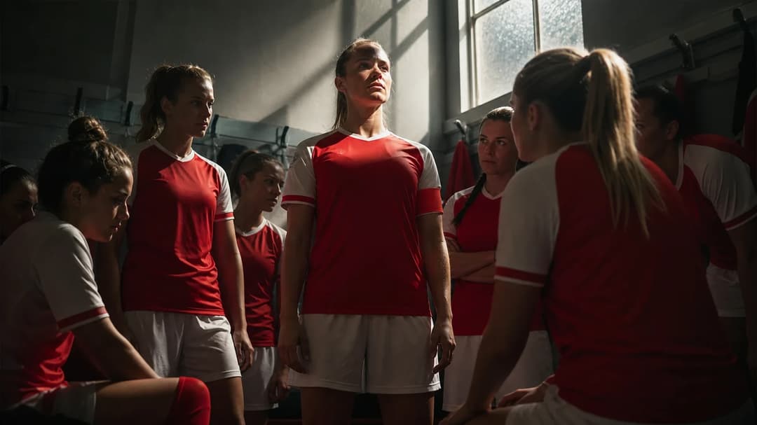 A group of female football players from FSV Mainz 05 in a locker room, preparing for a match.