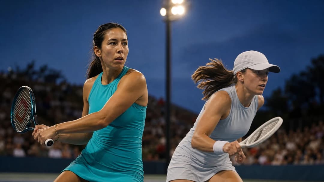 Jessica Pegula and Iga Swiatek in action during the Cincinnati Open semi-finals under dusk lighting.