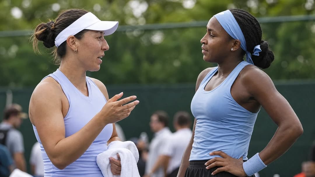 Jessica Pegula and Coco Gauff engaged in conversation away from the practice courts