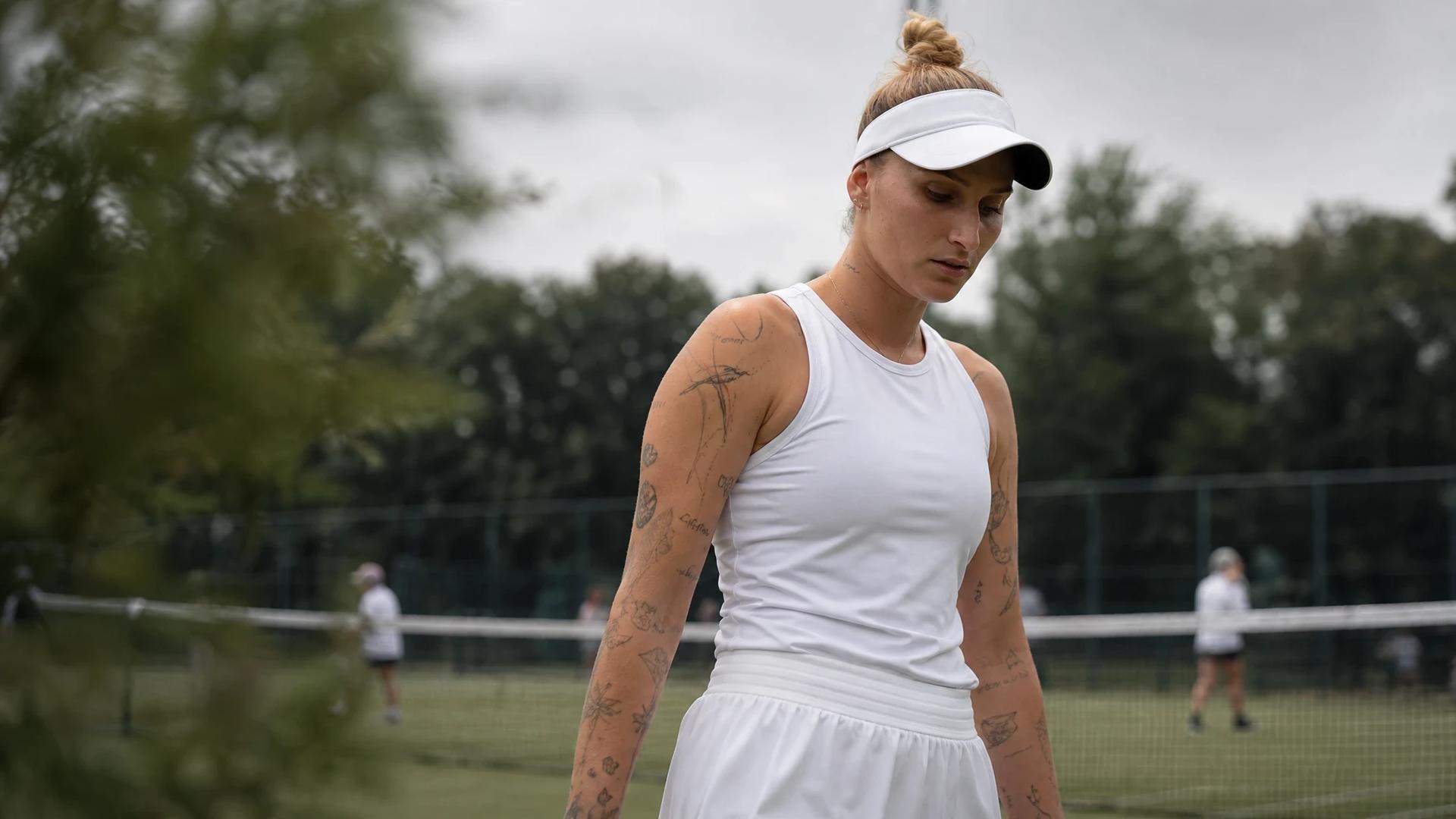 A contemplative Marketa Vondrousova walks on a tennis court, surrounded by supportive silhouettes.