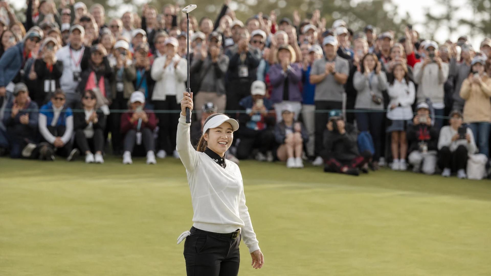 Miyu Yamashita celebrates her victory at the CPKC Women's Open with a crowd of fans in the background.