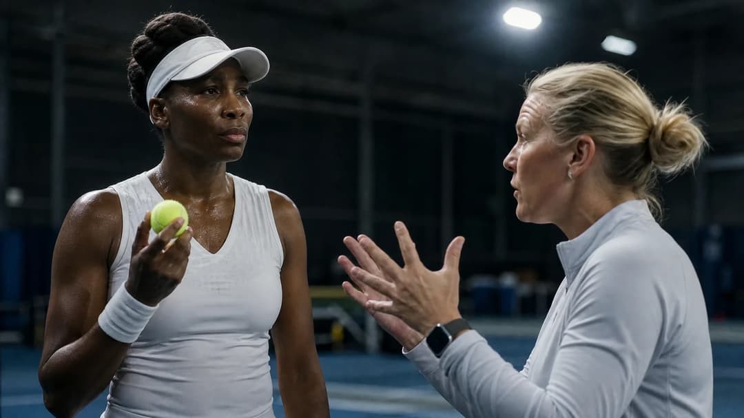 Venus Williams and Rennae Stubbs engage in a passionate discussion in a tennis training facility.