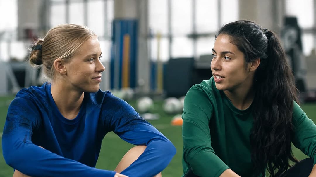 Weronika Araśniewicz and Alice Soto interact in a training facility.