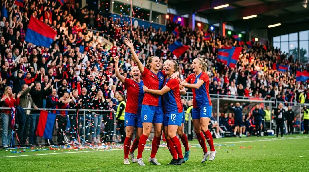 A group of Kristianstad players celebrating a goal amidst a vibrant crowd.