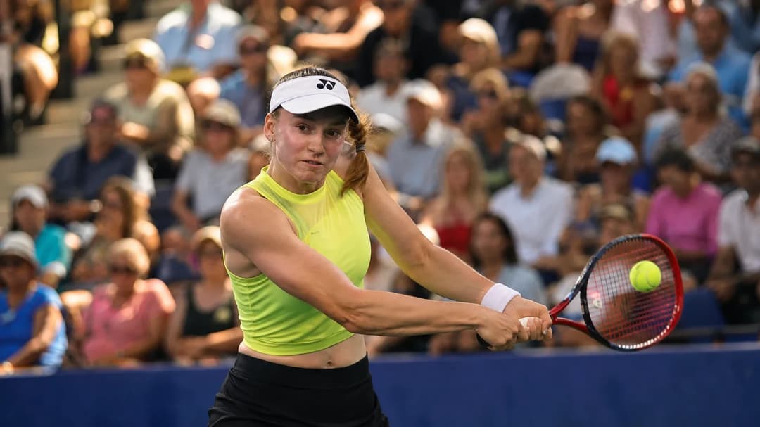 Elena Rybakina striking a powerful forehand shot during her match at the US Open.