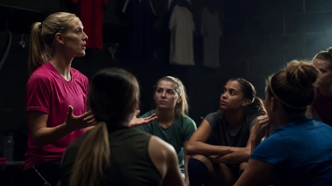 Kyra Spitzner and her teammates engaged in a strategic discussion during training.
