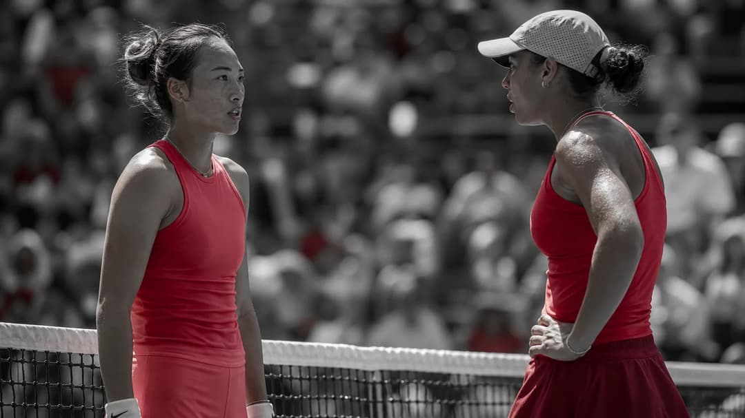 Tennis players Zheng Qinwen and Madison Keys exchange expressions during a tense moment at the US Open.