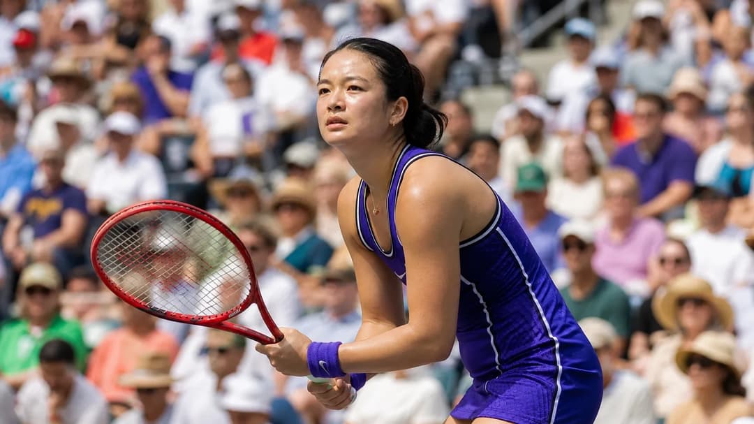 Alex Eala in action during a tennis match at Arthur Ashe Stadium.