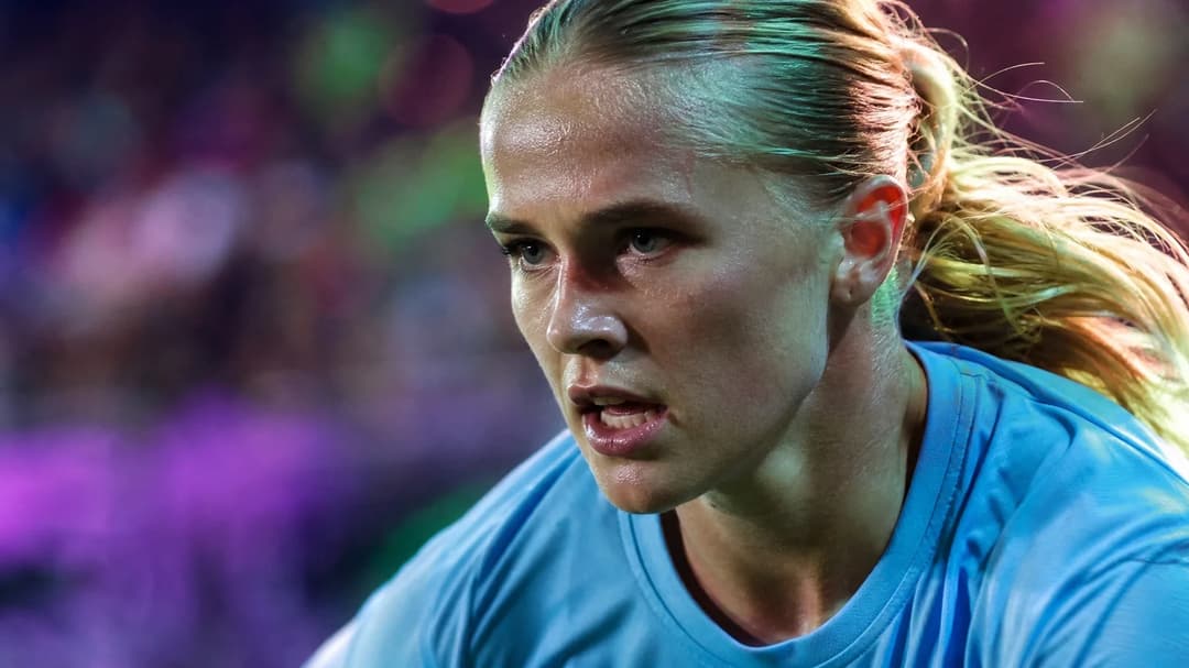 Extreme close-up of Tuva Skoog focused on the ball in a football match.
