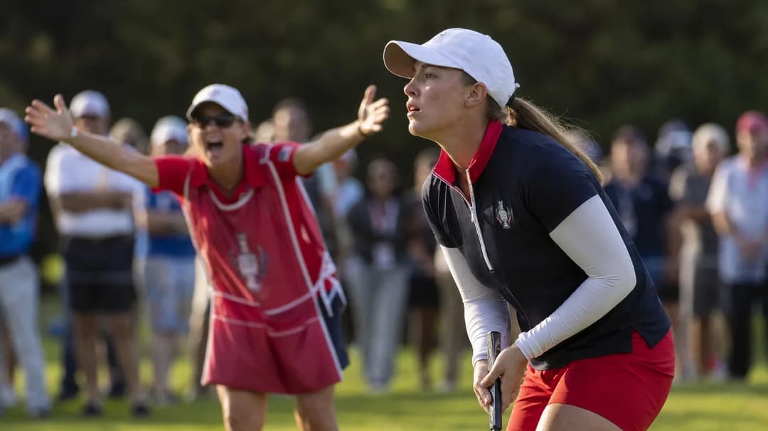 Jennifer Kupcho mid-swing with Angela Stanford cheering in the background at the Solheim Cup.