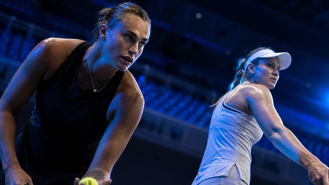 Aryna Sabalenka and Elena Rybakina in an intense moment during the US Open final.