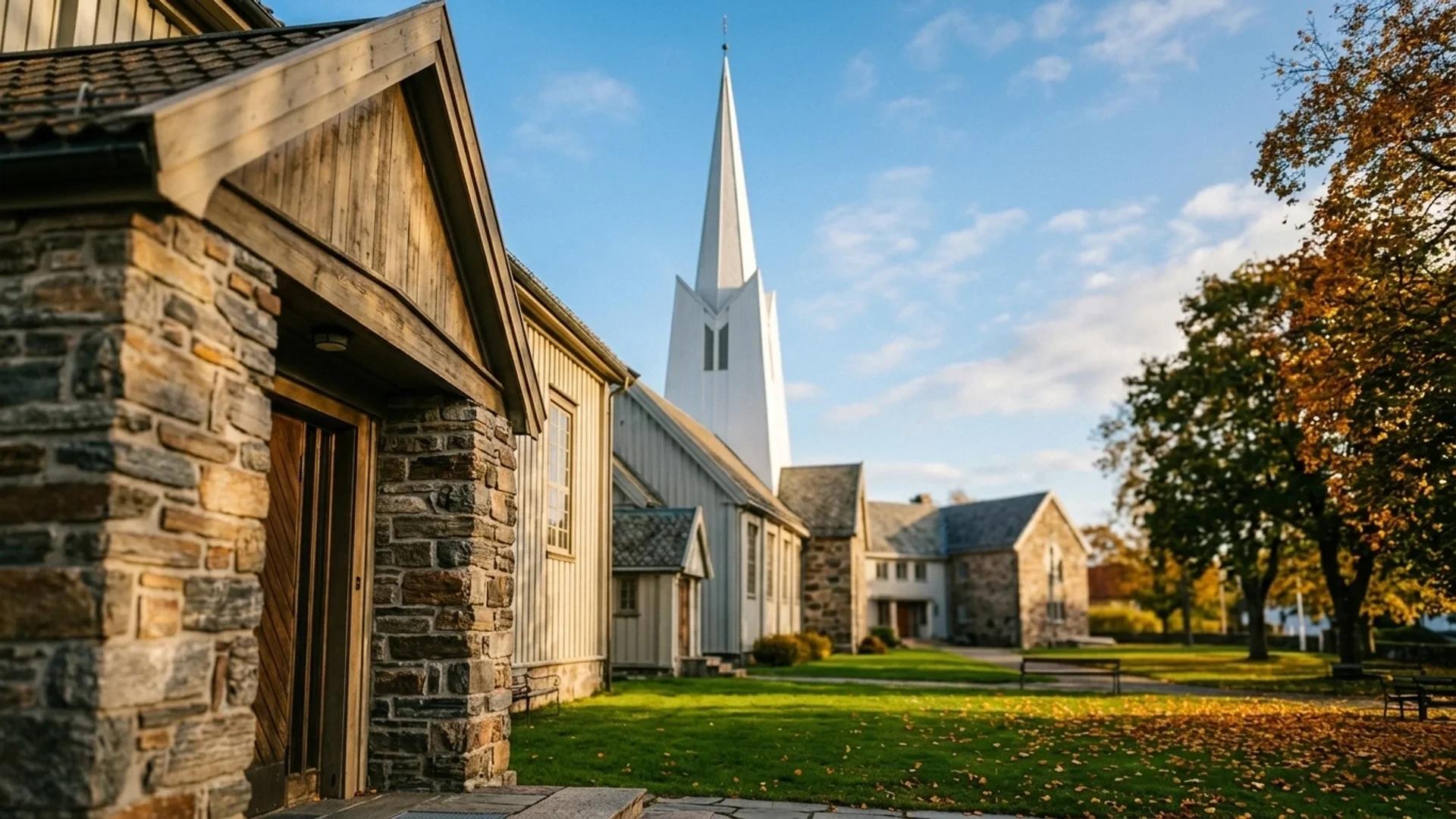 A close-up view of the stone facade of Larvik church under a bright sky.